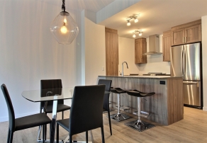 Unité modèle - salle à dîner et cuisiner