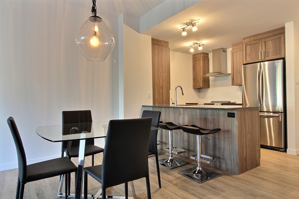 Unité modèle - salle à dîner et cuisiner